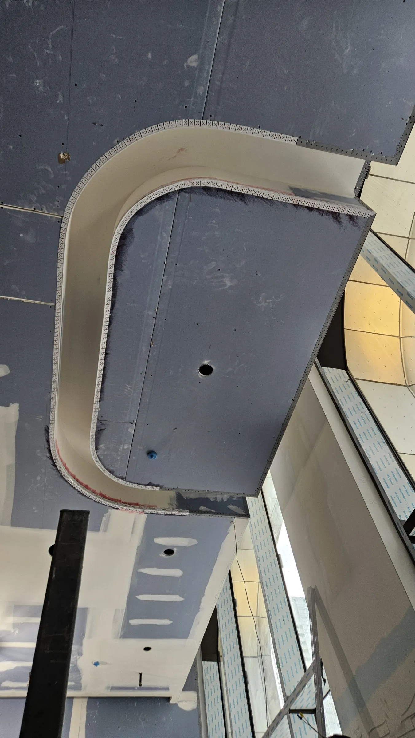 The same curved bulkhead boarded with a beaded radius edge