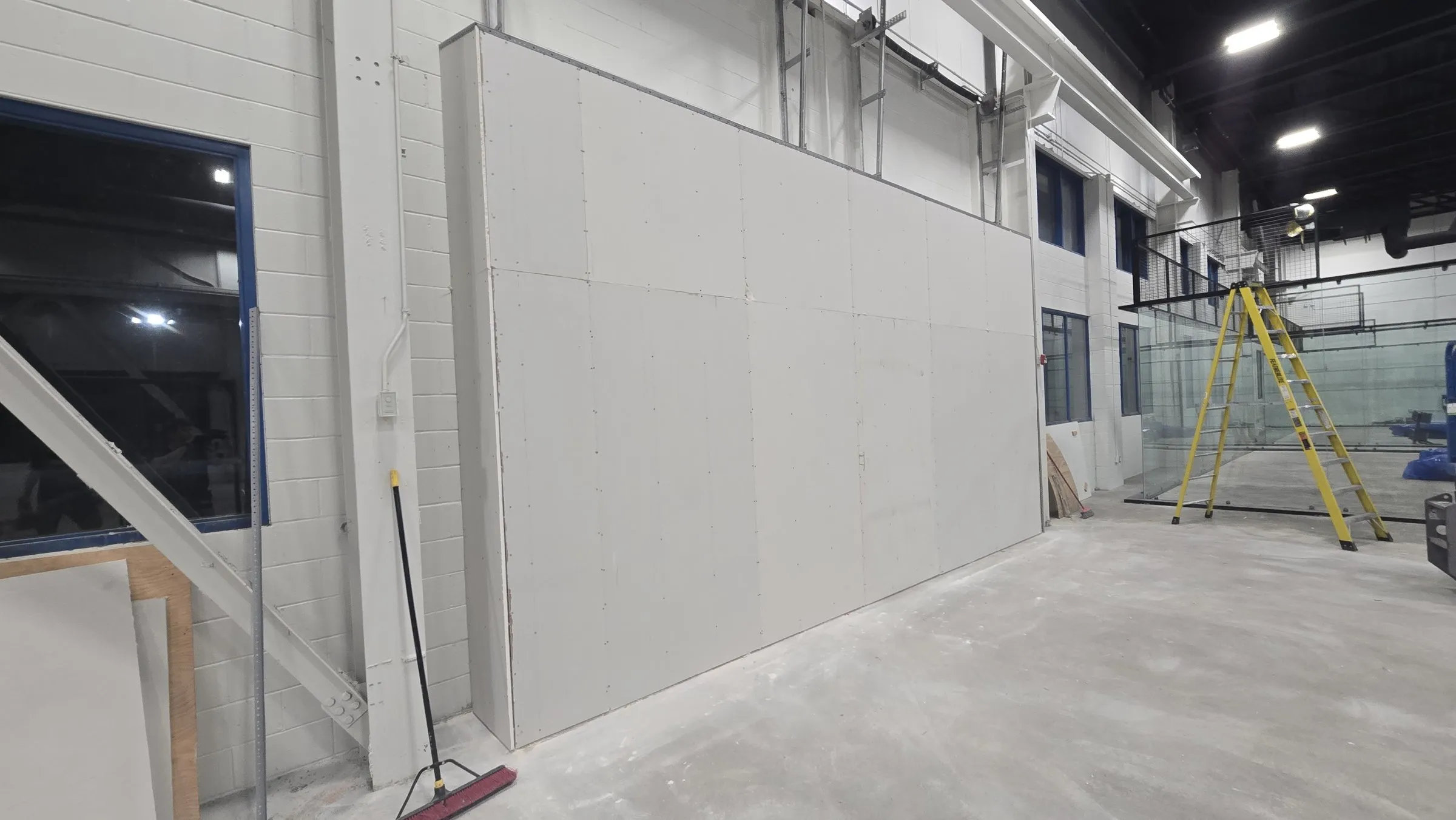Finished side of the new wall with drywall hung